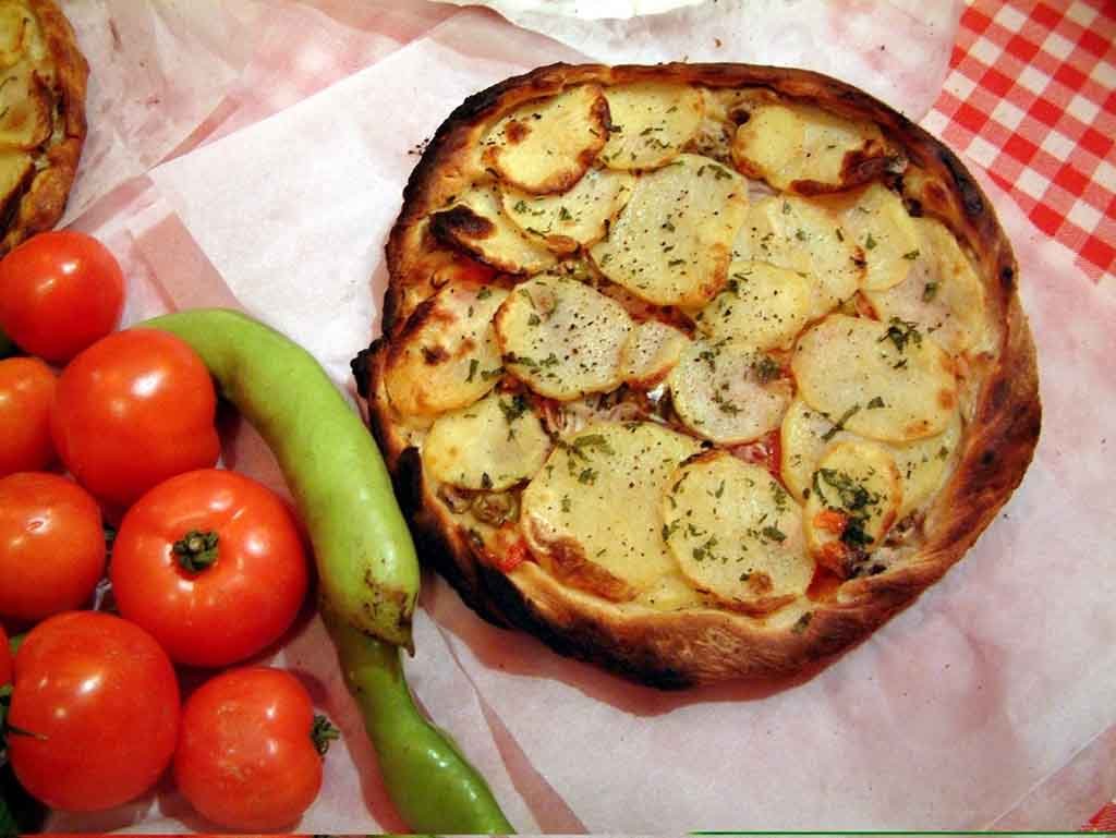 Ftira tradicional de Gozo é preparada em forno a lenha nas ilhas (Foto: VisitMalta) Ftira tradicional de Gozo é preparada em forno a lenha nas ilhas (Foto: VisitMalta)