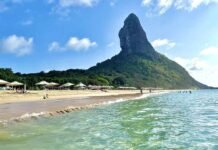 Fernando de Noronha une natureza e privacidade no turismo quiet luxury Fernando de Noronha reúne praias preservadas e biodiversidade marinha (Foto: Visite Noronha)